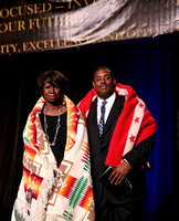 Mrs. Harriett Crouch and son Julius are wrapped in SAIGE blankets